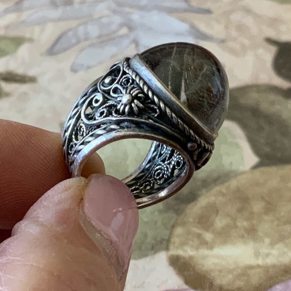 Ring with large glass stone